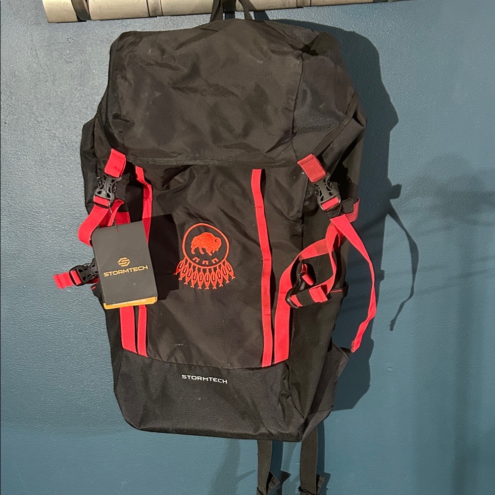 Storm Black Backpack with Red Accent Piikani Tribe Logo